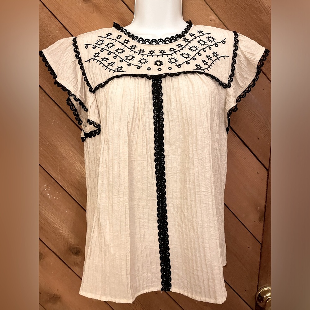 Ivory Blouse with Black Trim